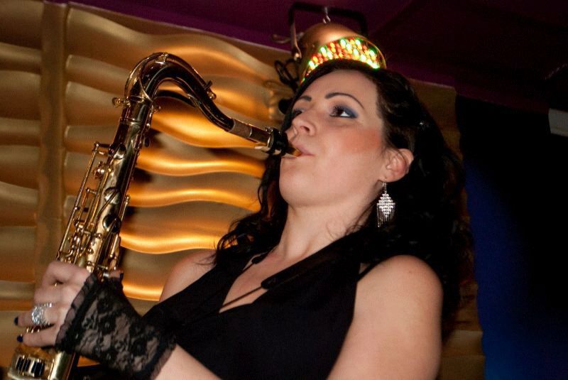 female saxophone players Doha Qatar